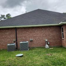 Reviving-the-Aesthetics-of-a-Residential-Roof-in-Lumberton-TX-with-Soft-Washing 0