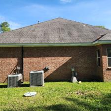 Reviving-the-Aesthetics-of-a-Residential-Roof-in-Lumberton-TX-with-Soft-Washing 1